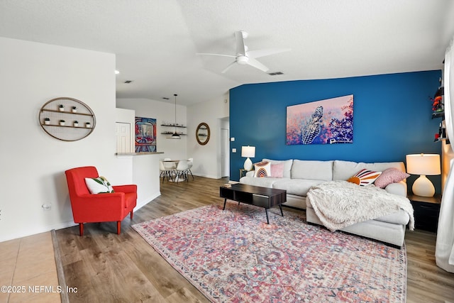157 Jardin De Mer Pl Unit 157, Jacksonville Beach, FL 32250 - living room featuring baseboards, ceiling fan, wood finished floors, and vaulted ceiling