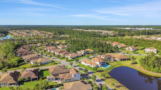 bird's eye view with a residential view and a water view