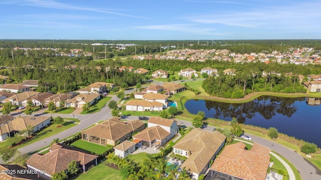 bird's eye view featuring a residential view and a water view
