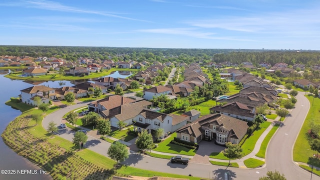 aerial view featuring a residential view and a water view