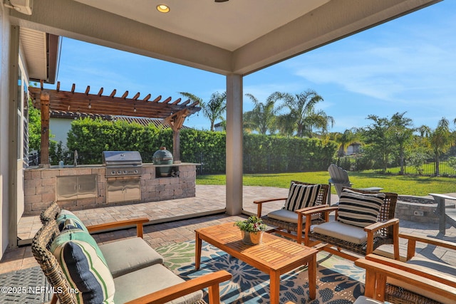 view of patio with area for grilling, a fenced backyard, and a pergola