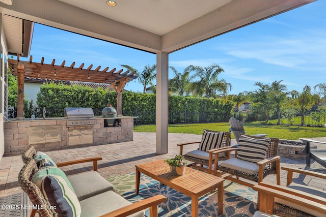 view of patio / terrace with a pergola, area for grilling, and a fenced backyard