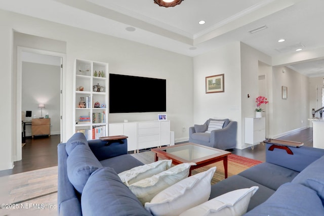 living room featuring crown molding, recessed lighting, and wood finished floors