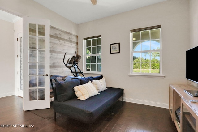 sitting room with hardwood / wood-style floors, french doors, and baseboards