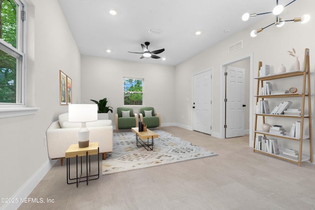7708 Galveston Ave, Jacksonville, FL 32211 - sitting room with baseboards, visible vents, ceiling fan with notable chandelier, and recessed lighting