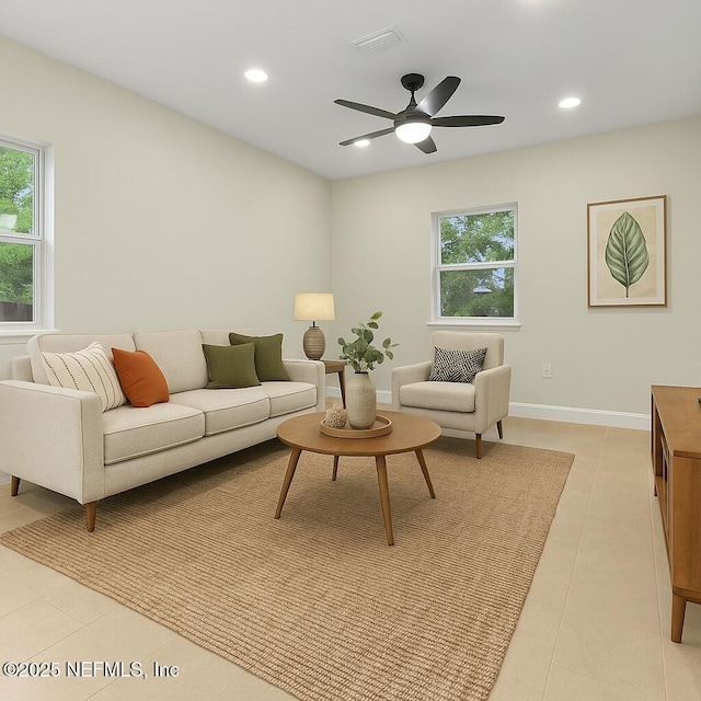 7708 Galveston Ave, Jacksonville, FL 32211 - living area featuring visible vents, light tile patterned floors, a healthy amount of sunlight, and recessed lighting