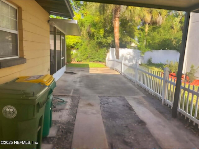 view of patio / terrace featuring fence