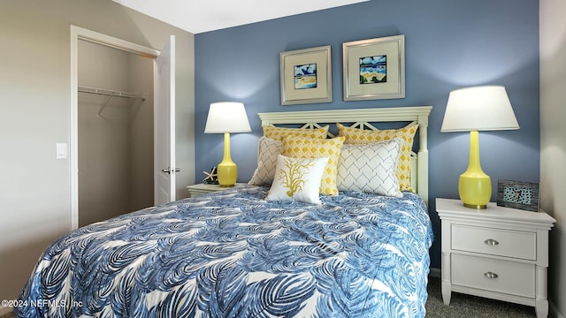 carpeted bedroom with a closet