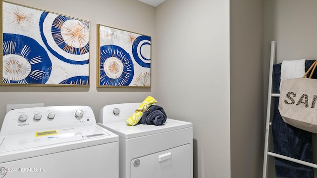 laundry area with independent washer and dryer and laundry area