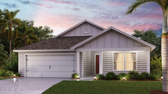 single story home featuring a yard, driveway, board and batten siding, roof with shingles, and an attached garage