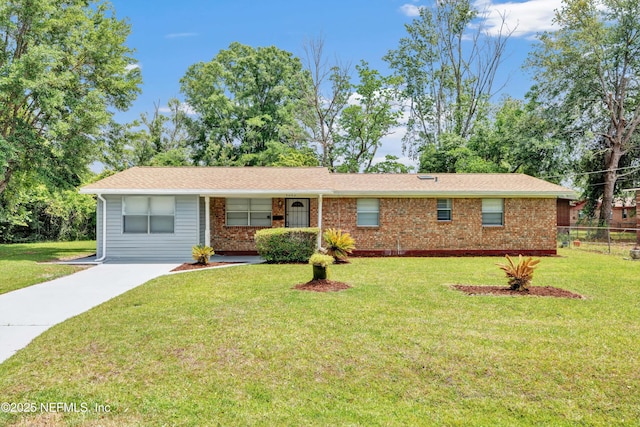 4043 Marland St, Jacksonville, FL 32209 - ranch-style home with fence, a front lawn, concrete driveway, and brick siding