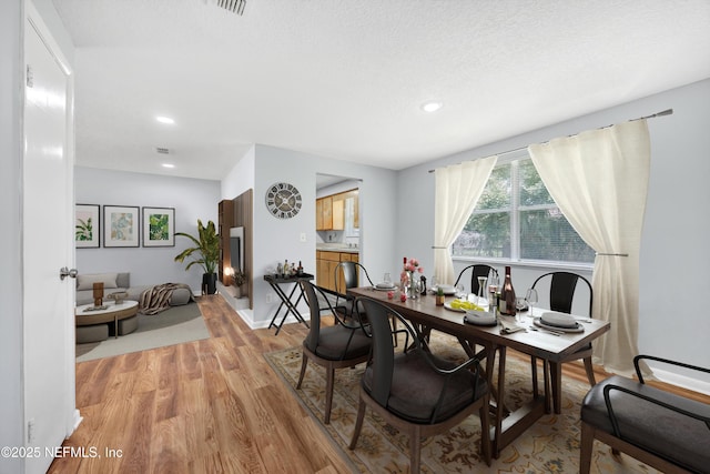 4043 Marland St, Jacksonville, FL 32209 - dining space featuring light wood-style floors, recessed lighting, and visible vents