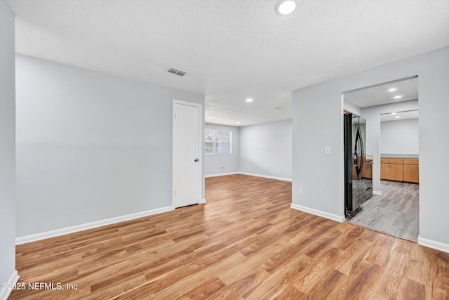 4043 Marland St, Jacksonville, FL 32209 - spare room featuring baseboards, recessed lighting, visible vents, and light wood-style floors