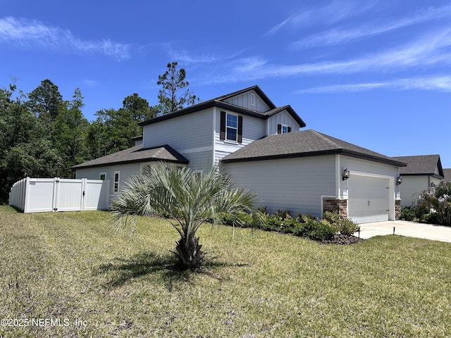 1116 Morgans Treasure Rd, Saint Augustine, FL 32084 - view of side of home featuring concrete driveway, a gate, an attached garage, and a yard