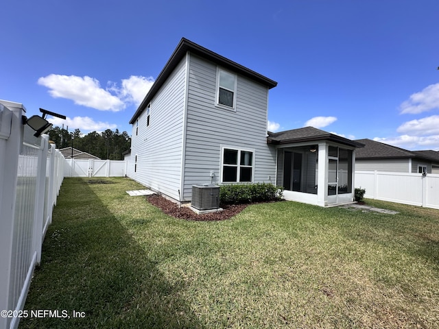 1116 Morgans Treasure Rd, Saint Augustine, FL 32084 - rear view of property featuring a sunroom, a fenced backyard, a gate, cooling unit, and a yard