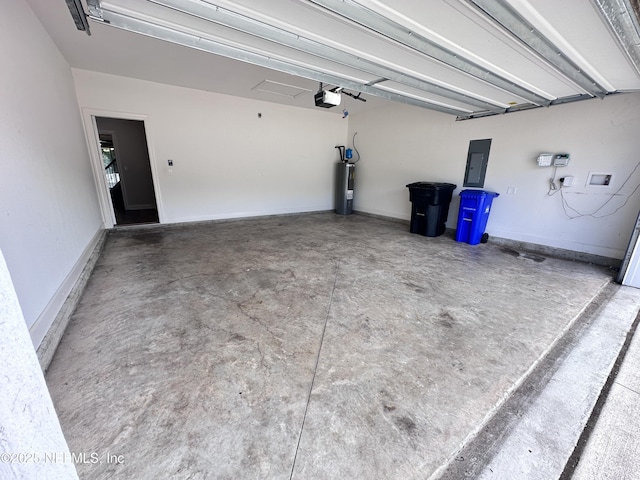 1116 Morgans Treasure Rd, Saint Augustine, FL 32084 - garage featuring water heater, a garage door opener, and electric panel