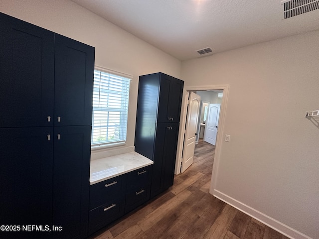 1116 Morgans Treasure Rd, Saint Augustine, FL 32084 - mudroom with baseboards, visible vents, and dark wood-style floors