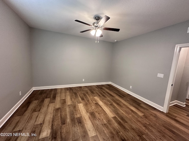 1116 Morgans Treasure Rd, Saint Augustine, FL 32084 - unfurnished room with baseboards, dark wood finished floors, and ceiling fan