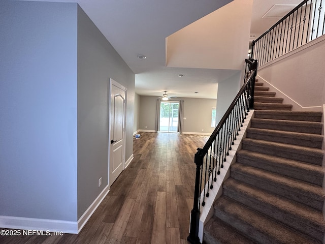 1116 Morgans Treasure Rd, Saint Augustine, FL 32084 - staircase featuring baseboards, ceiling fan, and wood finished floors