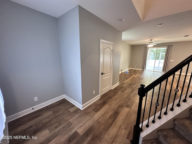 1116 Morgans Treasure Rd, Saint Augustine, FL 32084 - staircase featuring baseboards, ceiling fan, and wood finished floors