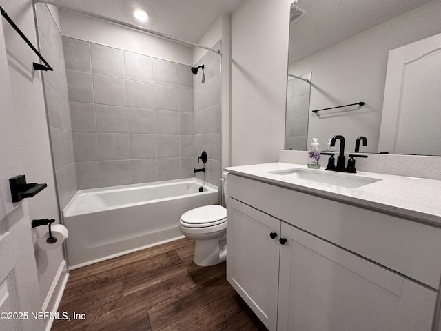 1116 Morgans Treasure Rd, Saint Augustine, FL 32084 - full bathroom featuring toilet, shower / bath combination, wood finished floors, and vanity