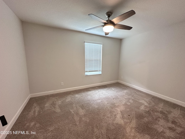 1116 Morgans Treasure Rd, Saint Augustine, FL 32084 - carpeted spare room featuring baseboards, a textured ceiling, and ceiling fan