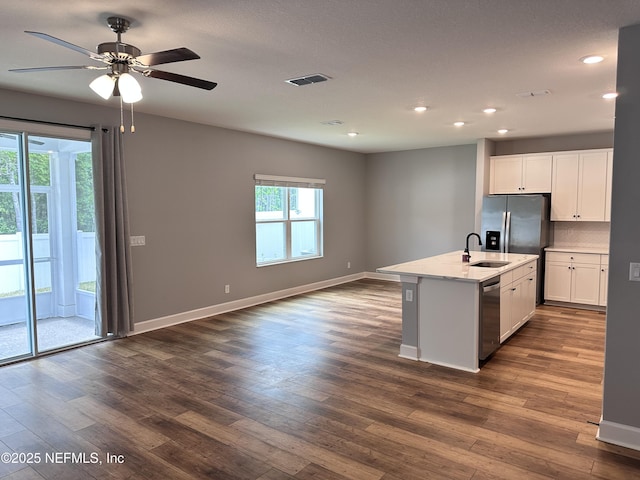 1116 Morgans Treasure Rd, Saint Augustine, FL 32084 - kitchen with a sink, baseboards, stainless steel appliances, and visible vents