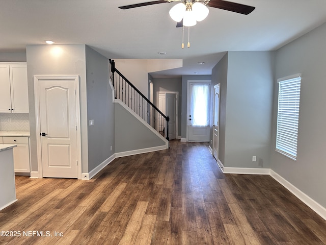 1116 Morgans Treasure Rd, Saint Augustine, FL 32084 - interior space with a ceiling fan, baseboards, wood finished floors, and stairway