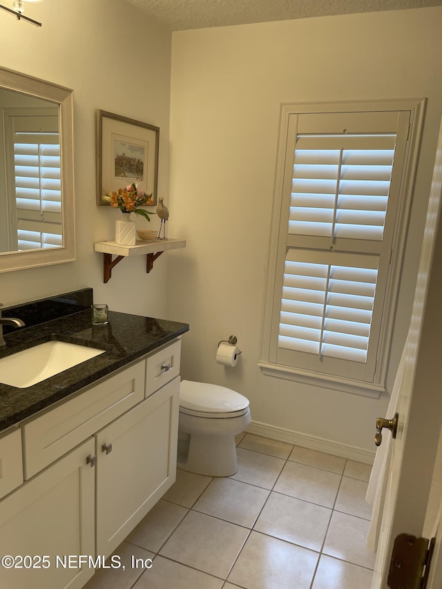 1207 Makarios Dr, Saint Augustine Beach, FL 32080 - half bath featuring tile patterned floors and vanity