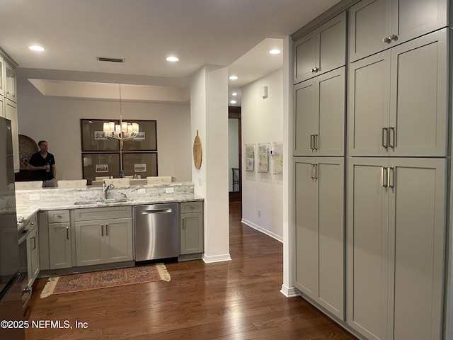 1207 Makarios Dr, Saint Augustine Beach, FL 32080 - kitchen with dishwasher, gray cabinets, dark wood finished floors, a chandelier, and light stone counters
