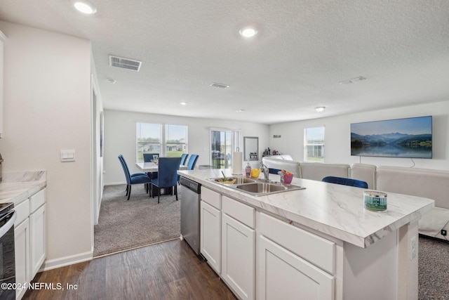 3416 Concord Ct, Green Cove Springs, FL 32043 - kitchen featuring dark wood finished floors, appliances with stainless steel finishes, a sink, visible vents, and open floor plan