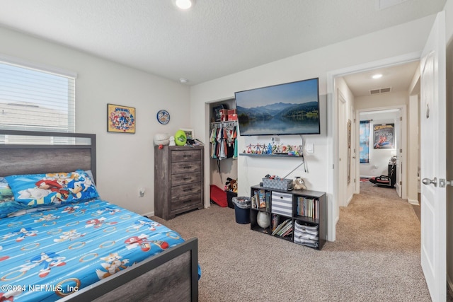 3416 Concord Ct, Green Cove Springs, FL 32043 - carpeted bedroom featuring a textured ceiling, visible vents, recessed lighting, and a closet