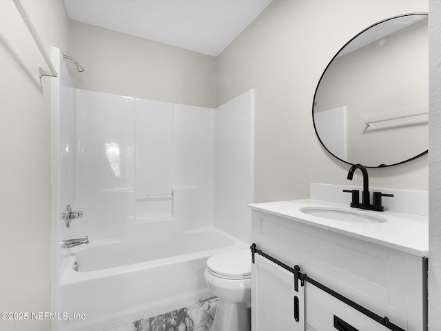full bathroom featuring toilet, marble finish floor, vanity, and shower / bathing tub combination