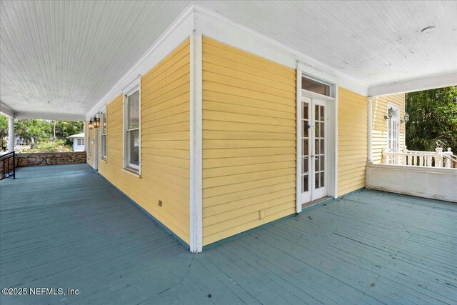223 Rainey Ave, Saint Augustine, FL 32084 - wooden terrace with covered porch