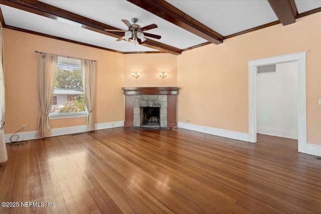 223 Rainey Ave, Saint Augustine, FL 32084 - unfurnished living room featuring beam ceiling, a fireplace, a ceiling fan, baseboards, and wood finished floors
