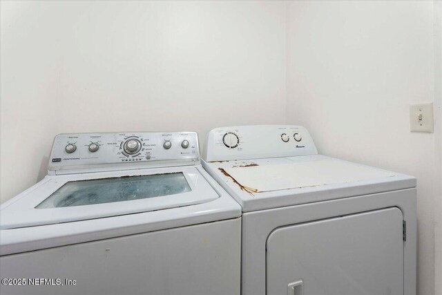 223 Rainey Ave, Saint Augustine, FL 32084 - clothes washing area featuring washer and dryer and laundry area