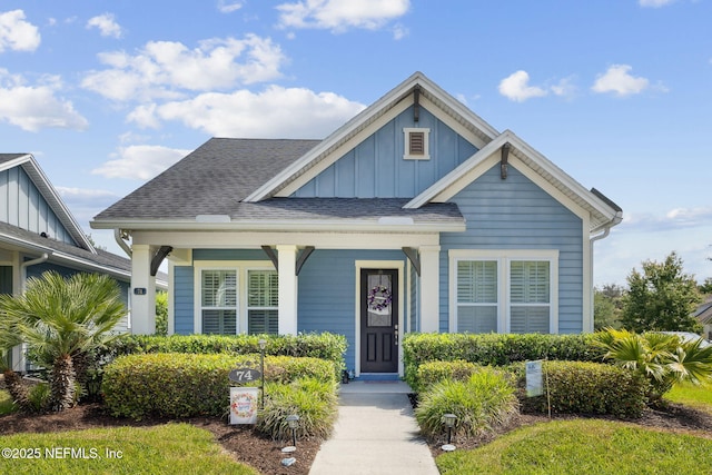 74 Lone Eagle Way, Ponte Vedra, FL 32081 - bungalow with roof with shingles, board and batten siding, and a porch