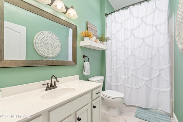 bathroom with toilet, tile patterned floors, vanity, and a shower with shower curtain