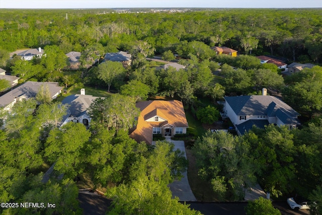 aerial view with a residential view and a forest view