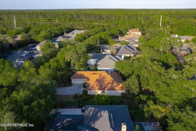 aerial view with a residential view and a forest view
