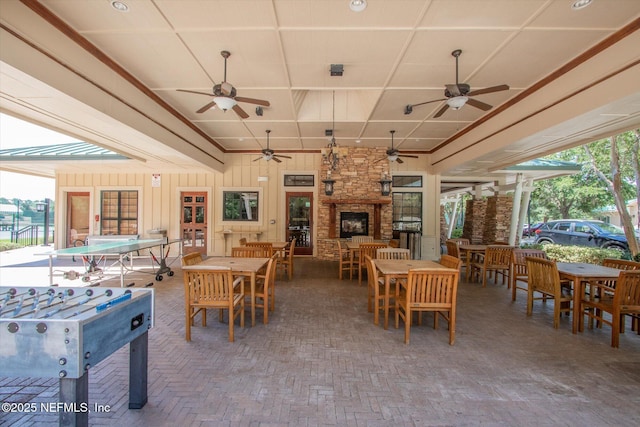 view of patio featuring outdoor dining space and a ceiling fan