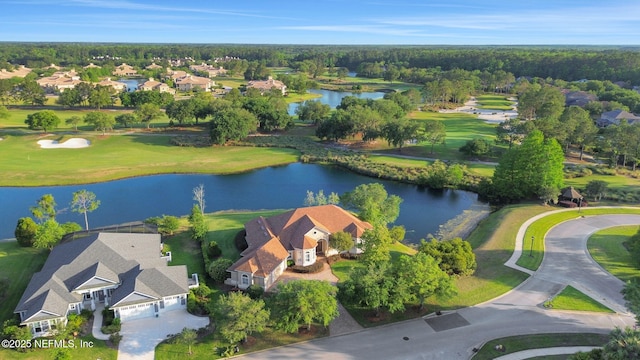 birds eye view of property featuring a residential view, a water view, and golf course view