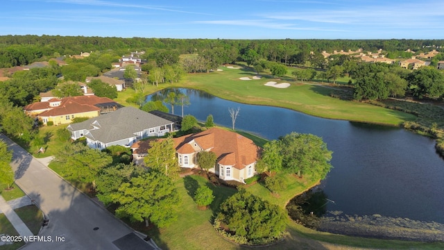 aerial view with a water view, view of golf course, and a residential view