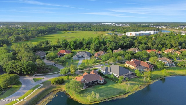 birds eye view of property with a water view and a residential view