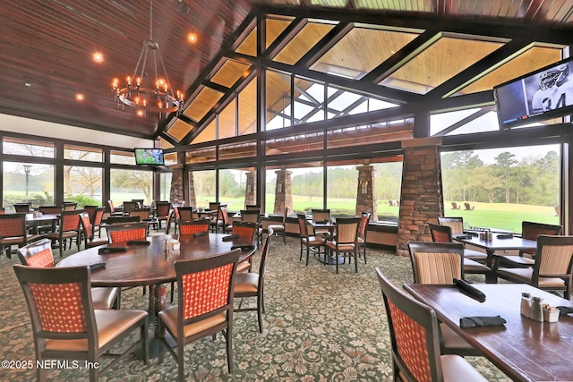 sunroom with a chandelier