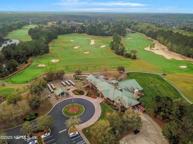 birds eye view of property featuring view of golf course