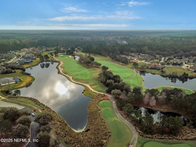 aerial view featuring a residential view, view of golf course, a water view, and a wooded view