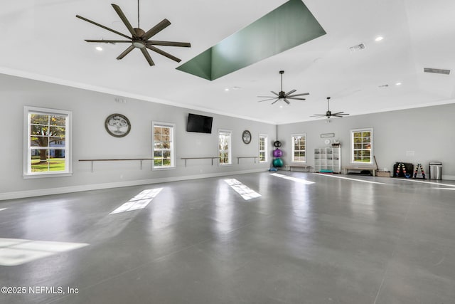 interior space featuring ceiling fan, visible vents, ornamental molding, recessed lighting, and a wealth of natural light