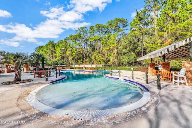 community pool featuring a patio