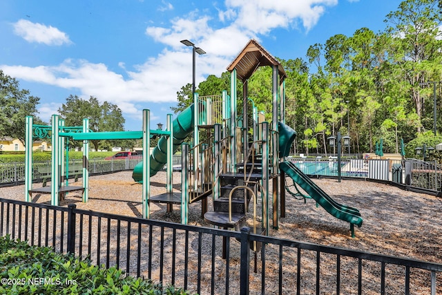 community play area featuring fence